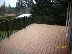 Beautiful contrasting composite decking with metal railing